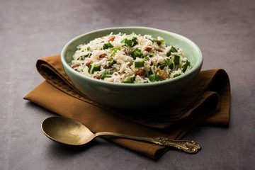 Okra or Bhindi rice also known as Vendakkai Sadam, served in a bowl, selective focus