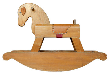old wooden rocking horse isolated on white