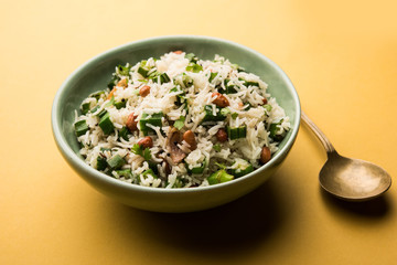 Okra or Bhindi rice also known as Vendakkai Sadam, served in a bowl, selective focus