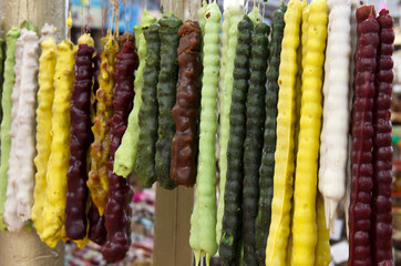 Traditional georgian homemade sweets churchkhela with nuts, and juice.