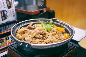 Gyudon, Japanese Simmered beef on the hotpot.