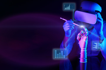 Engineer creates a robotic arm. Concept of cyber communication and robotic.