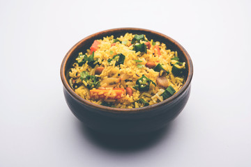 Okra or Bhindi rice also known as Vendakkai Sadam, served in a bowl, selective focus