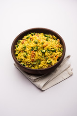 Okra or Bhindi rice also known as Vendakkai Sadam, served in a bowl, selective focus