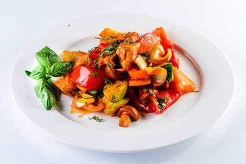chicken fillet with vegetables on a white background