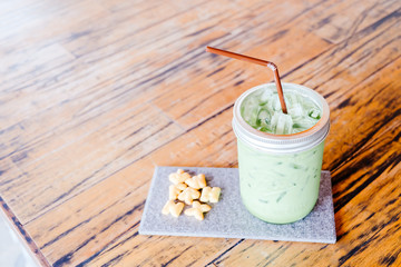 Ice green tea latte in the coffee shop