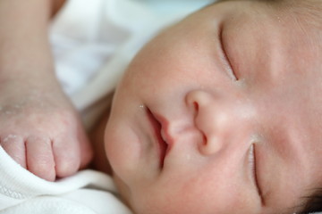 close up cute face of newborn baby softness sensitive skin