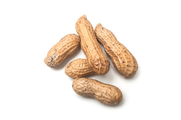 closeup of organic peanuts on top view on white background