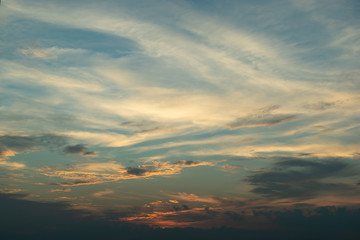 sunlight through cloud on dramatic sunset sky