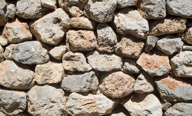 Colorful ancient stone wall  close up