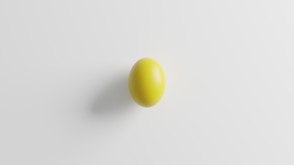 Yellow egg on white background