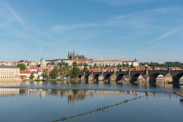 Fototapeta na wymiar Panoramic view of Prague Castle, St. Vitus Cathedral and Charles Bridge in Prague