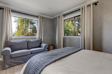 Grey elegant classic guest bedroom with venetian plaster walls and oak modern tone floor