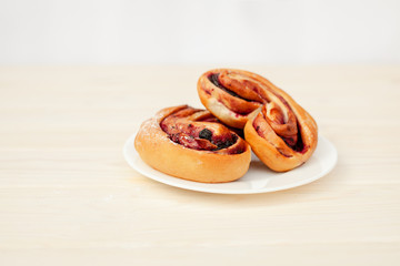 Rustic with black current berry pie on white background.