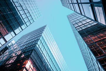 Fototapeta na wymiar Corporate office building facade and sky - business concept -