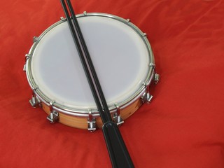 Tamborim and drumstick: a Brazilian percussion musical instrument. It is used to play samba, the...