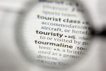 The word or phrase Touristy in a dictionary.