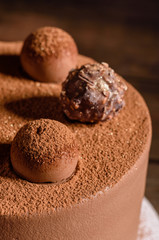 Christmas holiday table with delicious truffle cake and beautiful gingerbreads