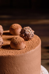 Christmas holiday table with delicious truffle cake and beautiful gingerbreads