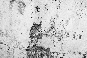 Texture of a concrete wall with cracks and scratches which can be used as a background