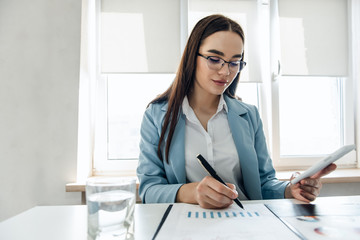 Businesswoman Working In Her Home Office.