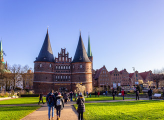 Obraz premium Holsten Gate, Lübeck, Germany - Sunny day at Christmas time