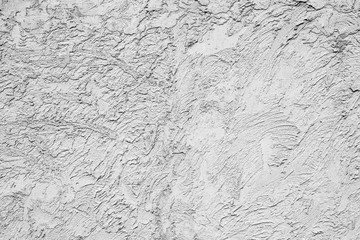 Texture of a concrete wall with cracks and scratches which can be used as a background