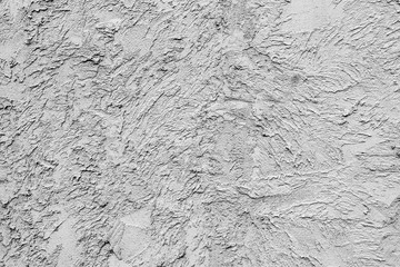 Texture of a concrete wall with cracks and scratches which can be used as a background