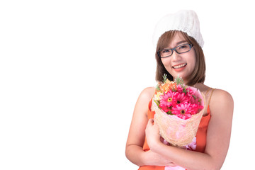 Asian woman wearing a red hat with beautiful bouquet of flowers on a nice day with a White background,attractive model having fun.