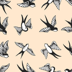 Seamless pattern with swallows in old school tattoo style. For poster, card, banner, flyer.