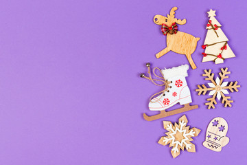 Top view of festive composition made of New Year decorations on colorful background. Merry Christmas concept with empty space for your design