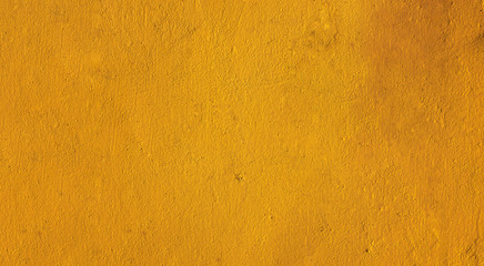 grungy matte yellow background closeup