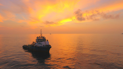 Obraz premium Oil and gas supply boat, transportation to bring all drilling equipment from shore to rig or platform.