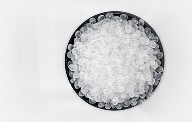 Polypropylene granule close-up background texture.