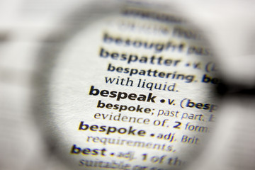 The word or phrase Bespeak in a dictionary.