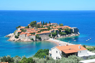 Naklejka na ściany i meble The beautiful island of Sveti Stefan (Sveti Stephan) in the Adriatic sea in the summer. Montenegro