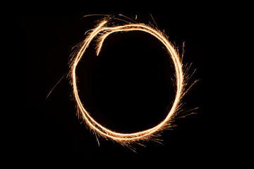 round shaped sparkle on black background