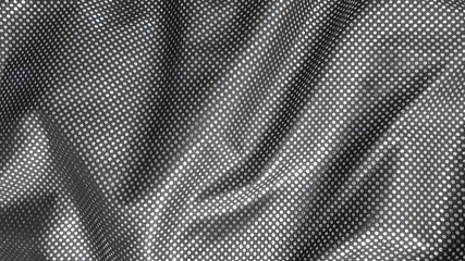 abstract polka dot silk fabric background close up © Mariia