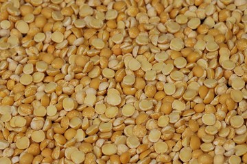 Yellow split peas background and texture