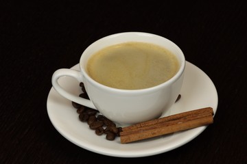 cup of coffee on black backround