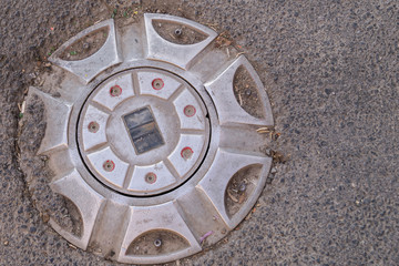 vintage metal sewer manhole cover