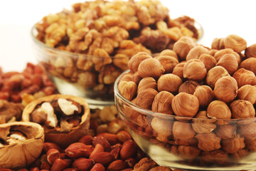 Different nuts in glass cups	