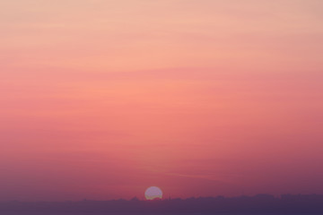 Sunrise in the pink sky