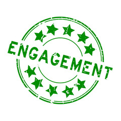 Grunge green engagement word with star icon round rubber seal stamp on white background