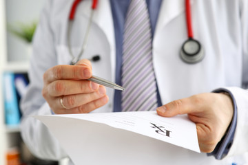 Male medicine doctor hand give prescription to patient