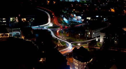 Fototapeta na wymiar View of two roundabout traffics by night at Dillenburg