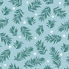 Fototapeta premium Vector green fir tree branches and snow seamless pattern on light blue background. Christmas and new year simple illustration. Hand-drawn design.