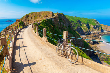 Bicycle parked on Isthmus on Sark Channel Islands UK