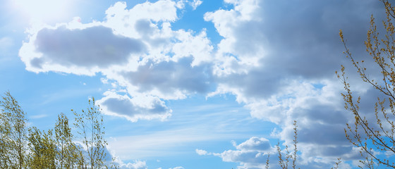 Fototapeta na wymiar Landscape country daylight village blue sky clouds field hills. Sunny