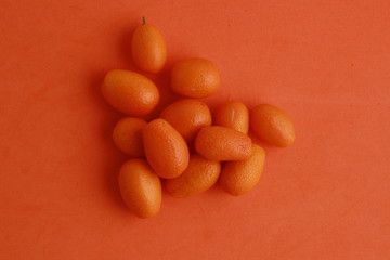small and delicious orange fruits kumquat